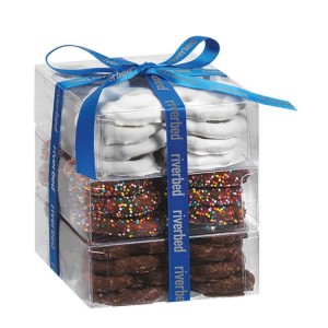 Chocolate Covered Pretzels in a clear box with a custom branded bow