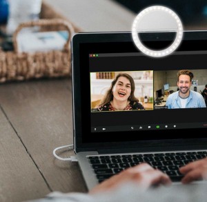 Selfie Ring shown on top of a laptop