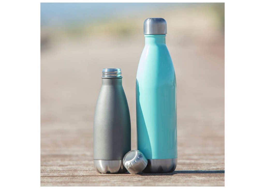 17 Oz. Swag Water Bottle shown next to a different sized bottle with an outdoor background
