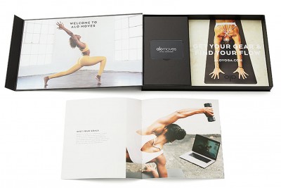 Alo Moves Fitness Subscription box and book opened