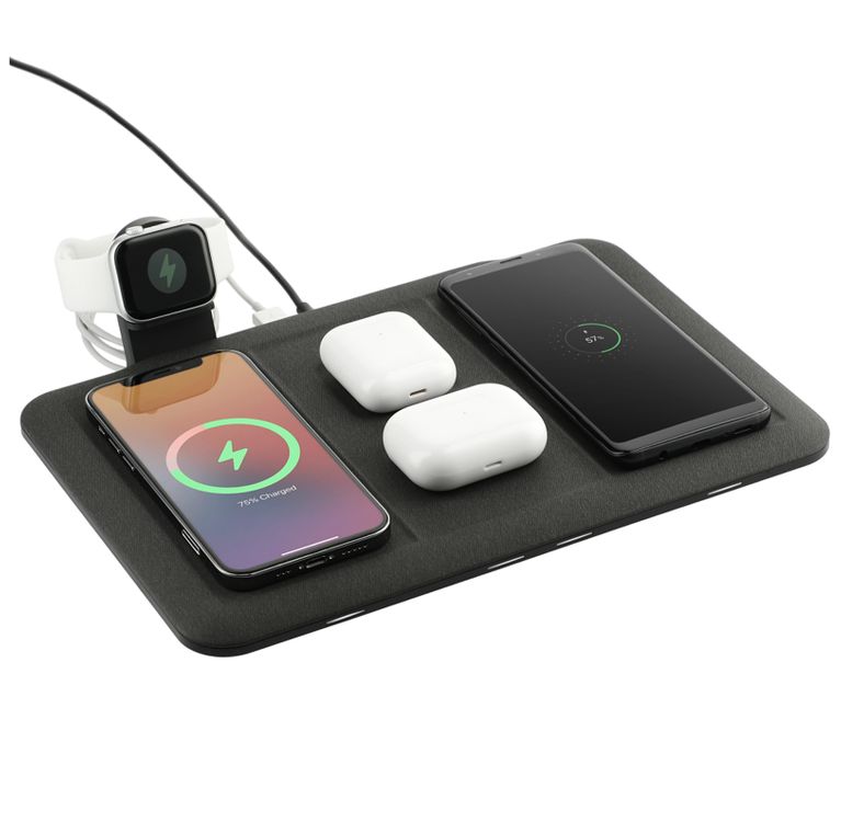 Mophie 4-in-1 Charging Mat shown with phones and accessories on top