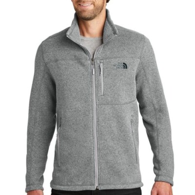 The North Face Unisex Fleece Jacket shown in Medium Gray on a male model
