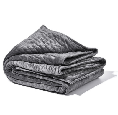 A Gravity Blanket shown in Grey and folded