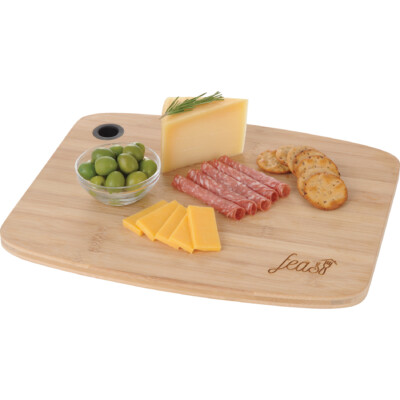 Bamboo Cutting Board shown with cheese, crackers, olives, and food on top