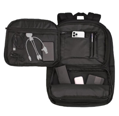 Canyon Backpack shown with its front compartments open with tech accessories inside