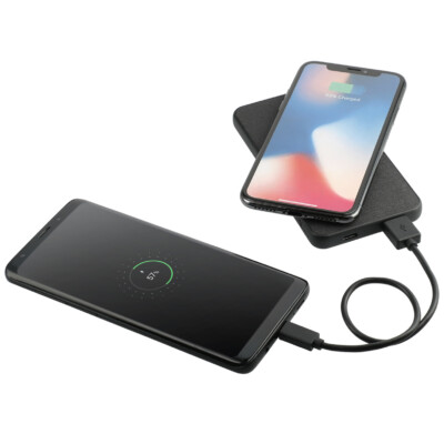 Mophie 5,000 MAh Wireless Power Bank shown charging a phone