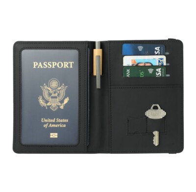 Deluxe Recycled Passport Wallet shown open with a passport, pen, key, and credit cards inside