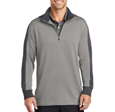Nike Dri-FIT Unisex Half-Zip Pullover in Athletic Grey Heather/Dark Grey on a male model