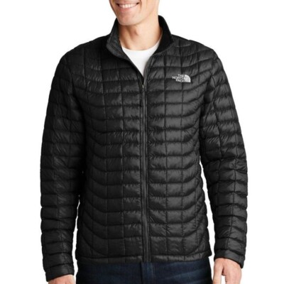 The North Face Unisex ThermoBall Trekker Jacket in black on a male model